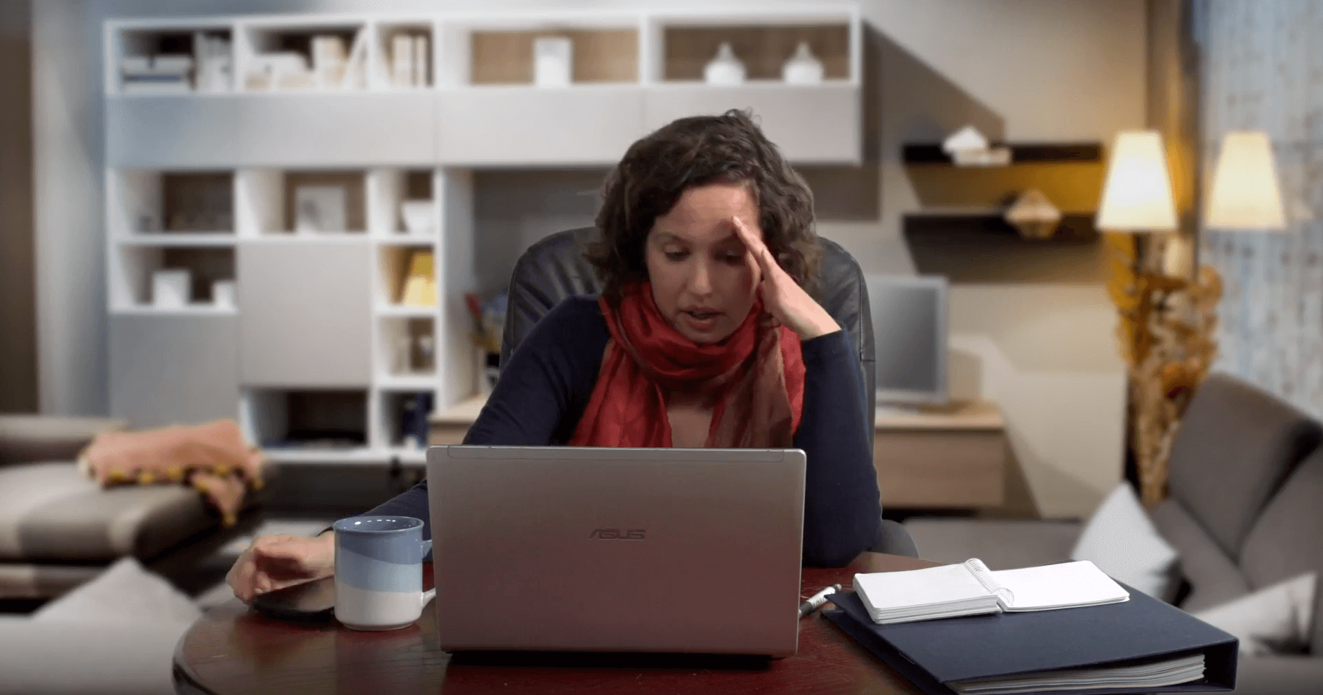 An employee is stressed while working from home.